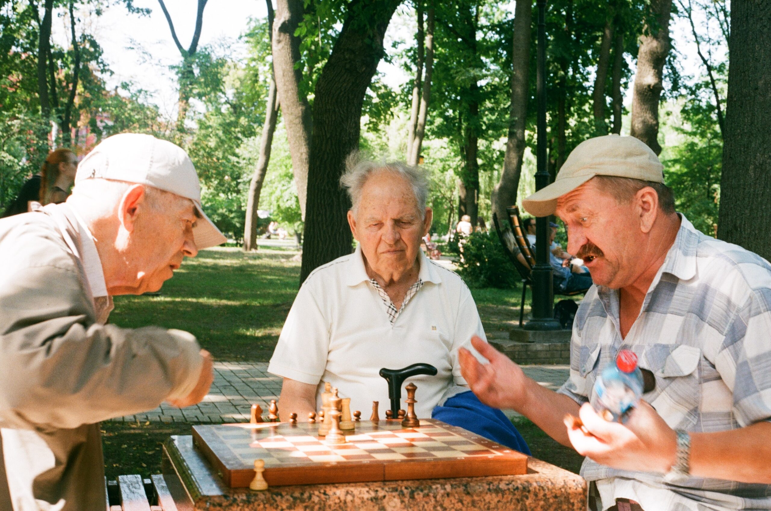 jusfilm-Two gentleman playing while friend watches on-unsplash (1)