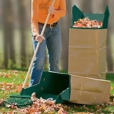 Leaf Chute in action homeowner with rake and chute