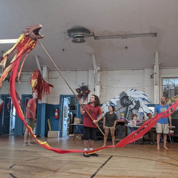 Sol Ramirez (puppeter) Animating Dragon puppet for Secondhand Theatre