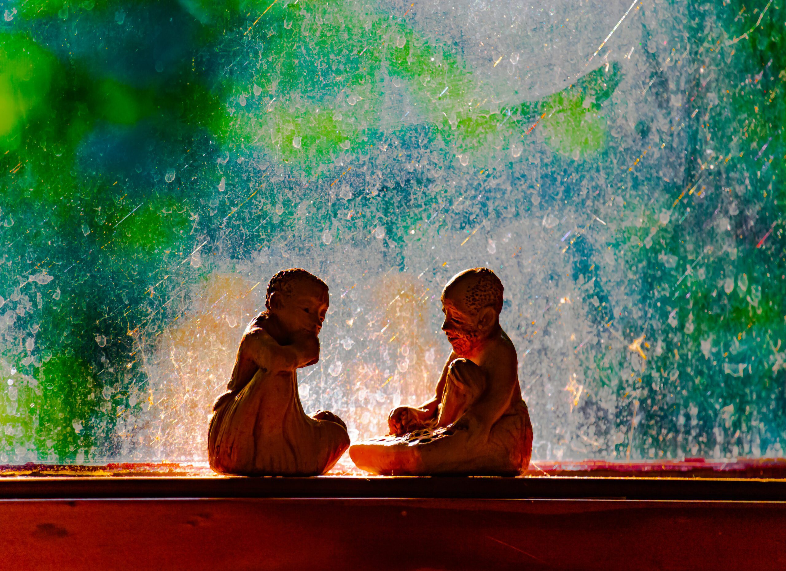 Uploaded on November 4, 2021 image two figurines at window sill talking Uploaded on November 4, 2021 image two figurines at window sill talking