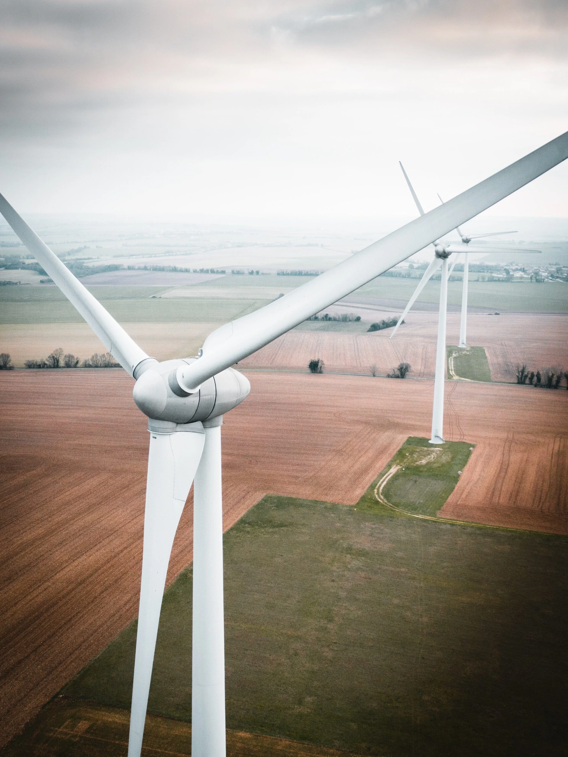gonz-ddl-Wind-Turbines-up-close-unsplash-scaled