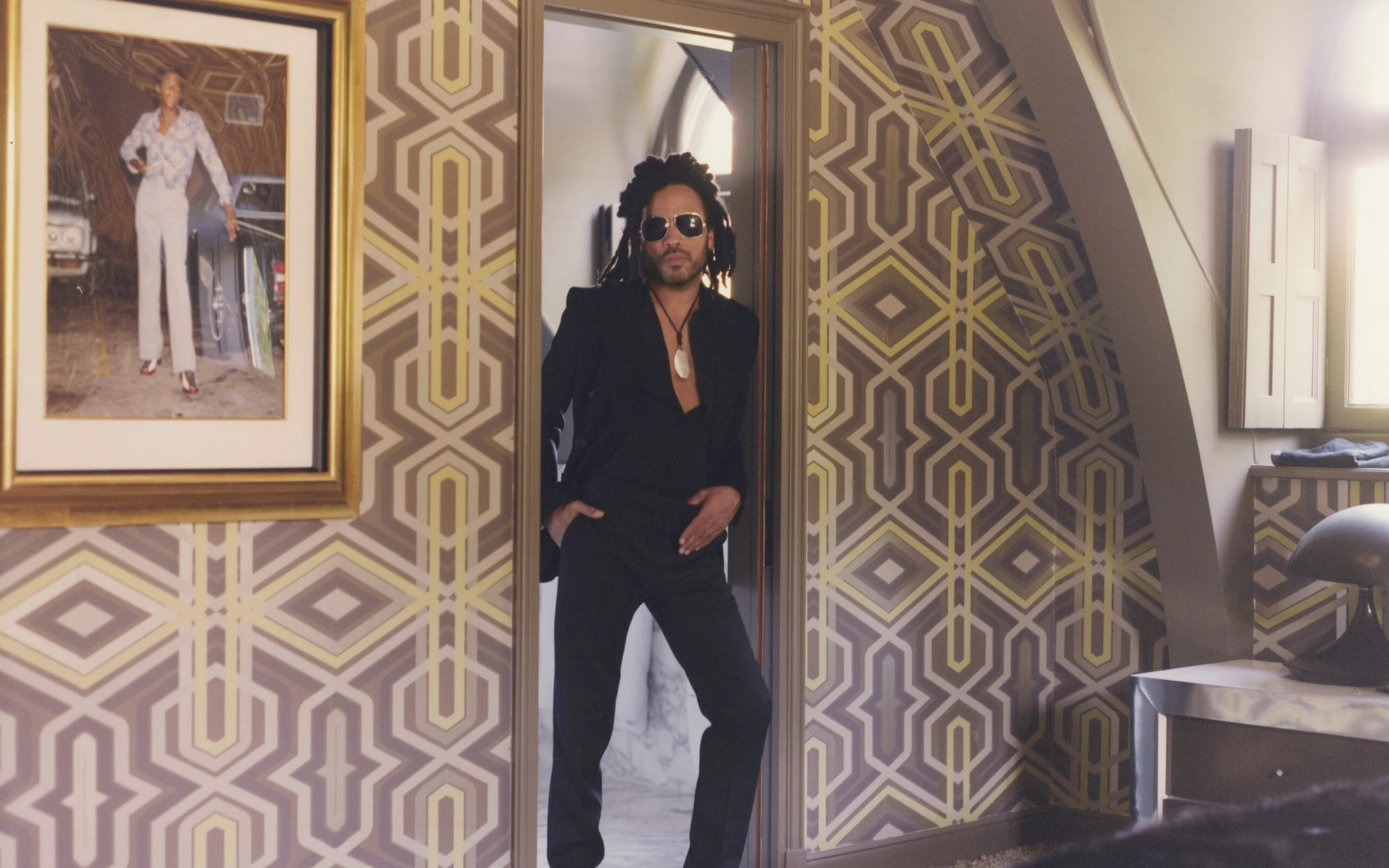 Lenny in archway of his home 