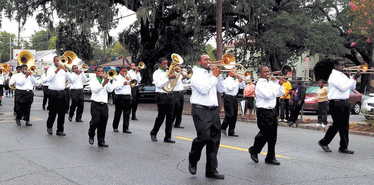 the United House of Prayer for All People Band marching in parade