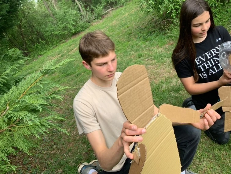 Jasper and Erin with blank masks for the Time we Have 1,2,3 Puppetry