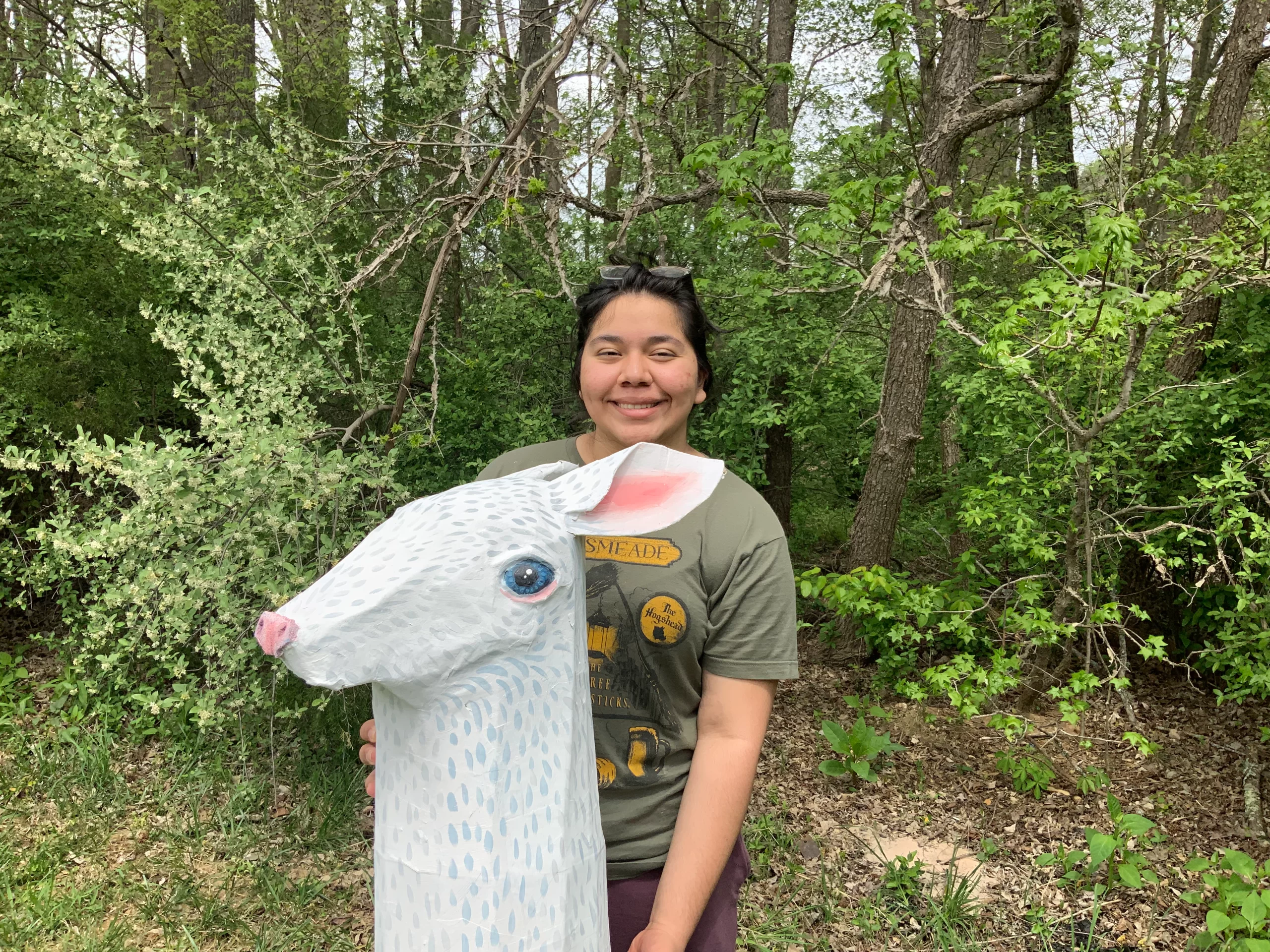 Melanie holding Albino Deer Head mask for 1,2,3 Puppetry The Time We Have play