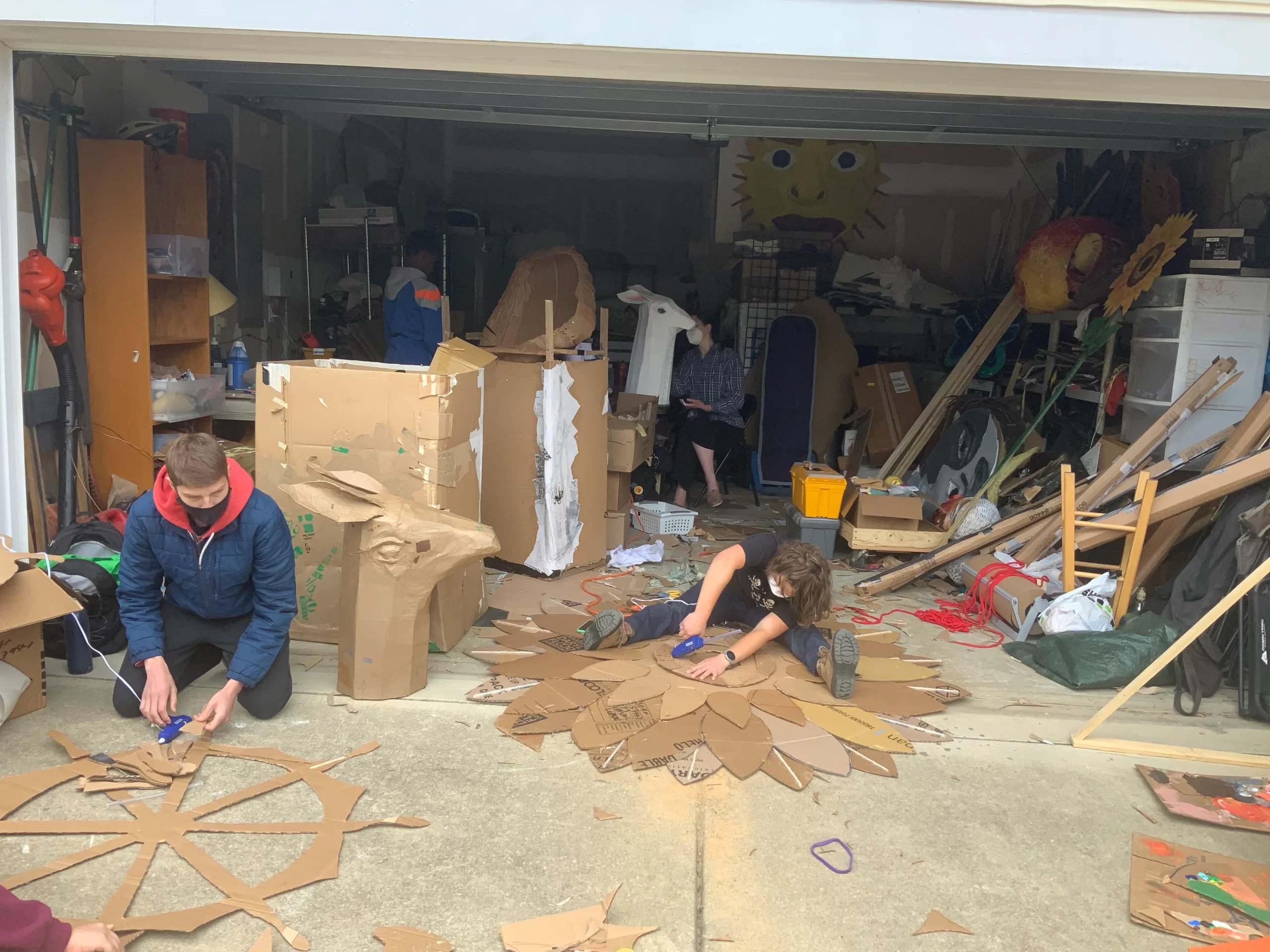  Sol Ramirez and Aaron Working on masks and sets for The time We Have 1,2,3 Puppetry production April 2022webp.w