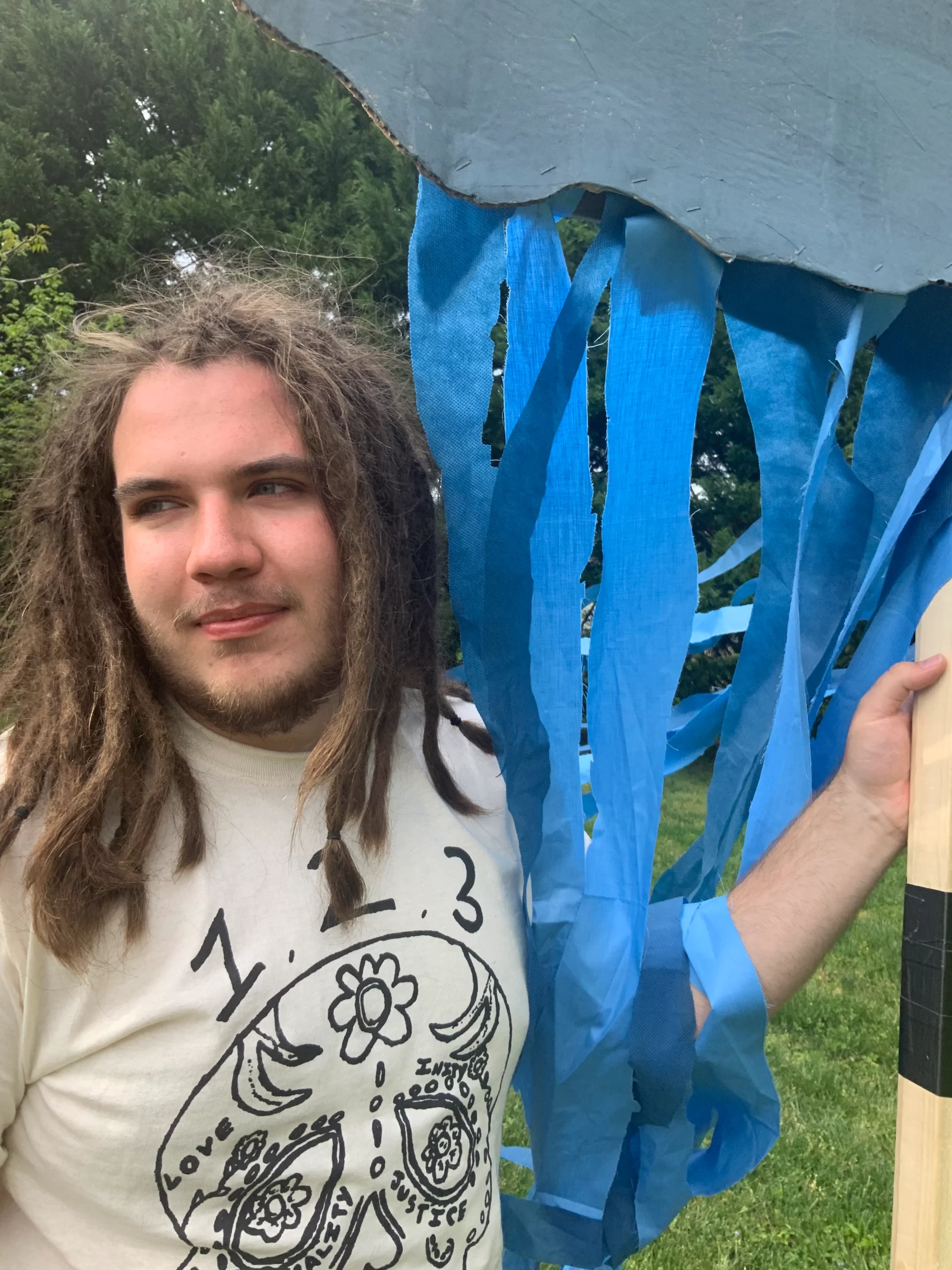 Sol Ramirez holding up puppet for the tIme we have 1,2,3 puppetry April 2022webp