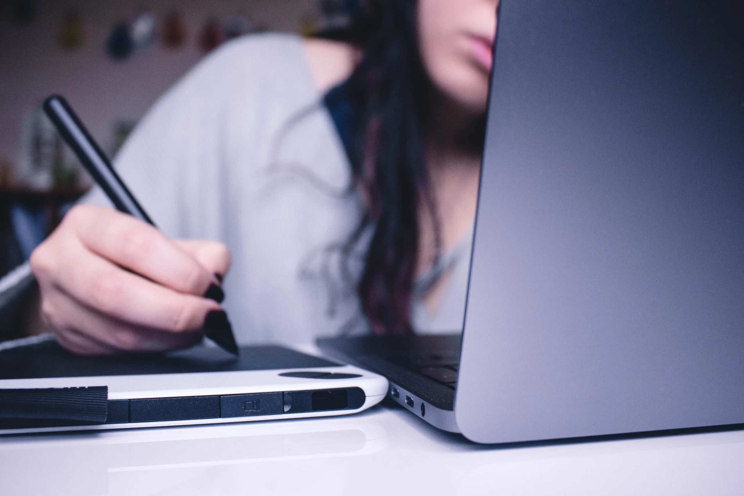josefa-ndiaz-Student deep in study on laptop unsplash