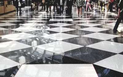 evan-r-S1p_Chiicago Airport customers walking thru International customs -unsplash