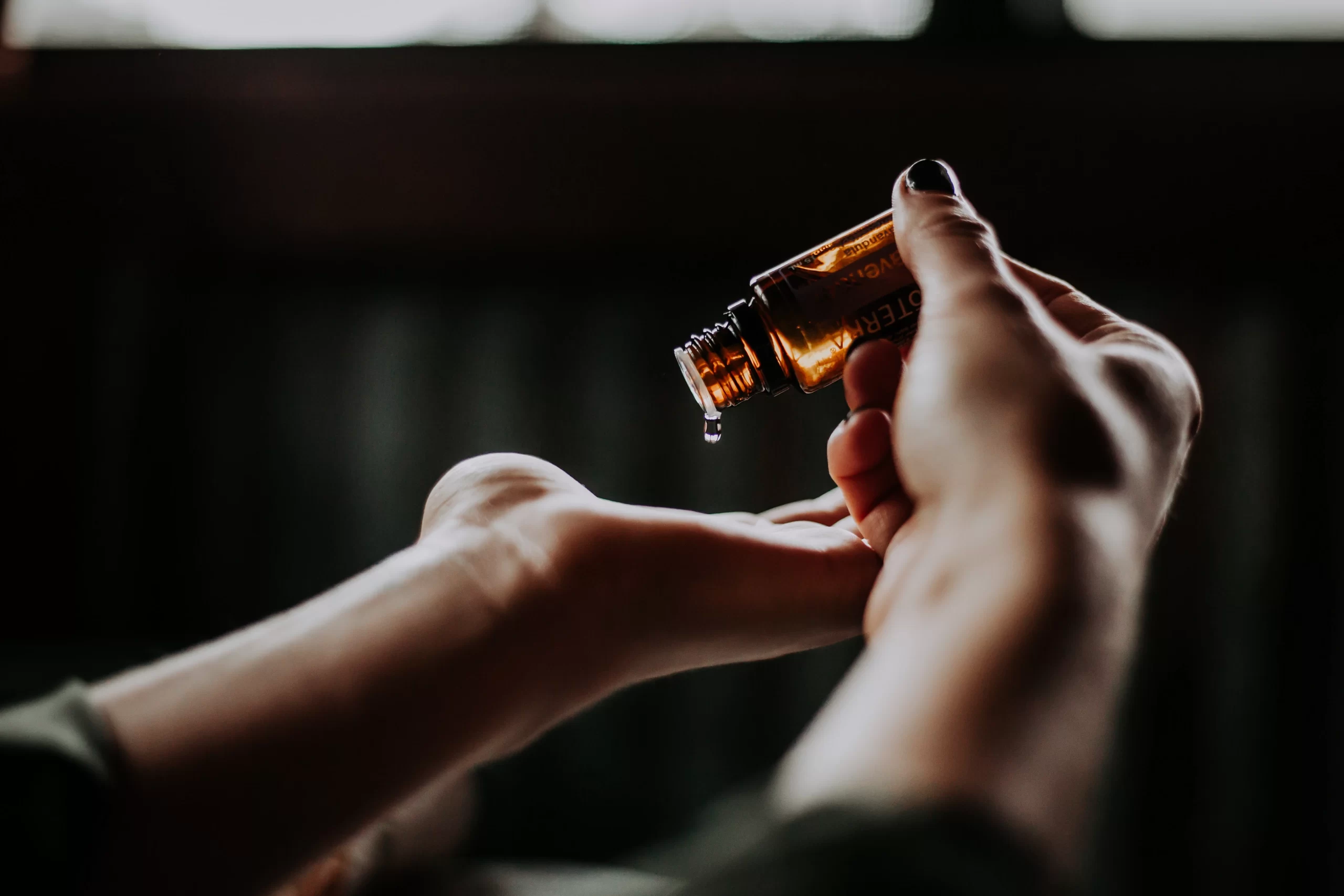christin-hume-two hands with liquid collagen-unsplash christin-hume-two hands with liquid collagen-unsplash