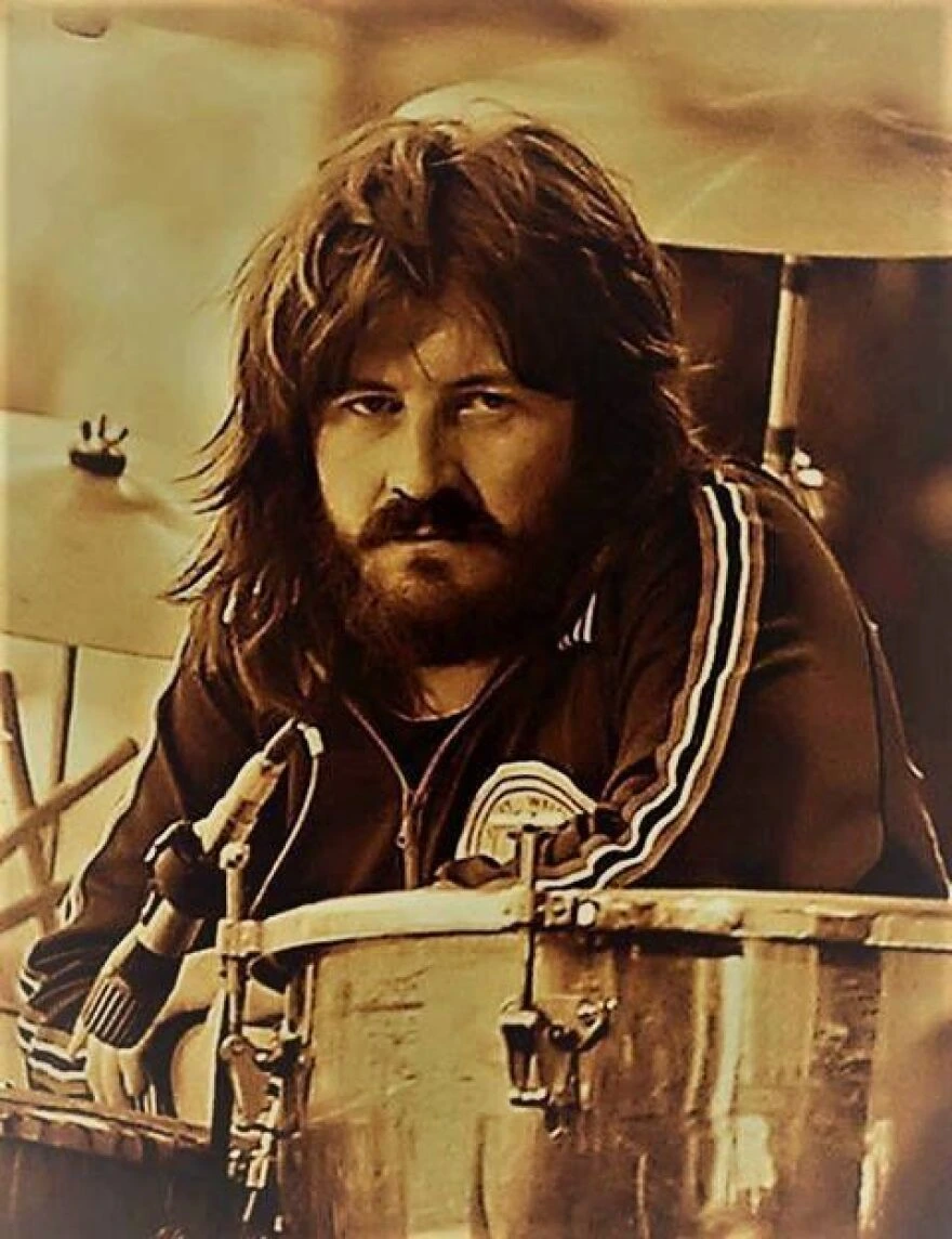 John Bonham leaning over drum Kit