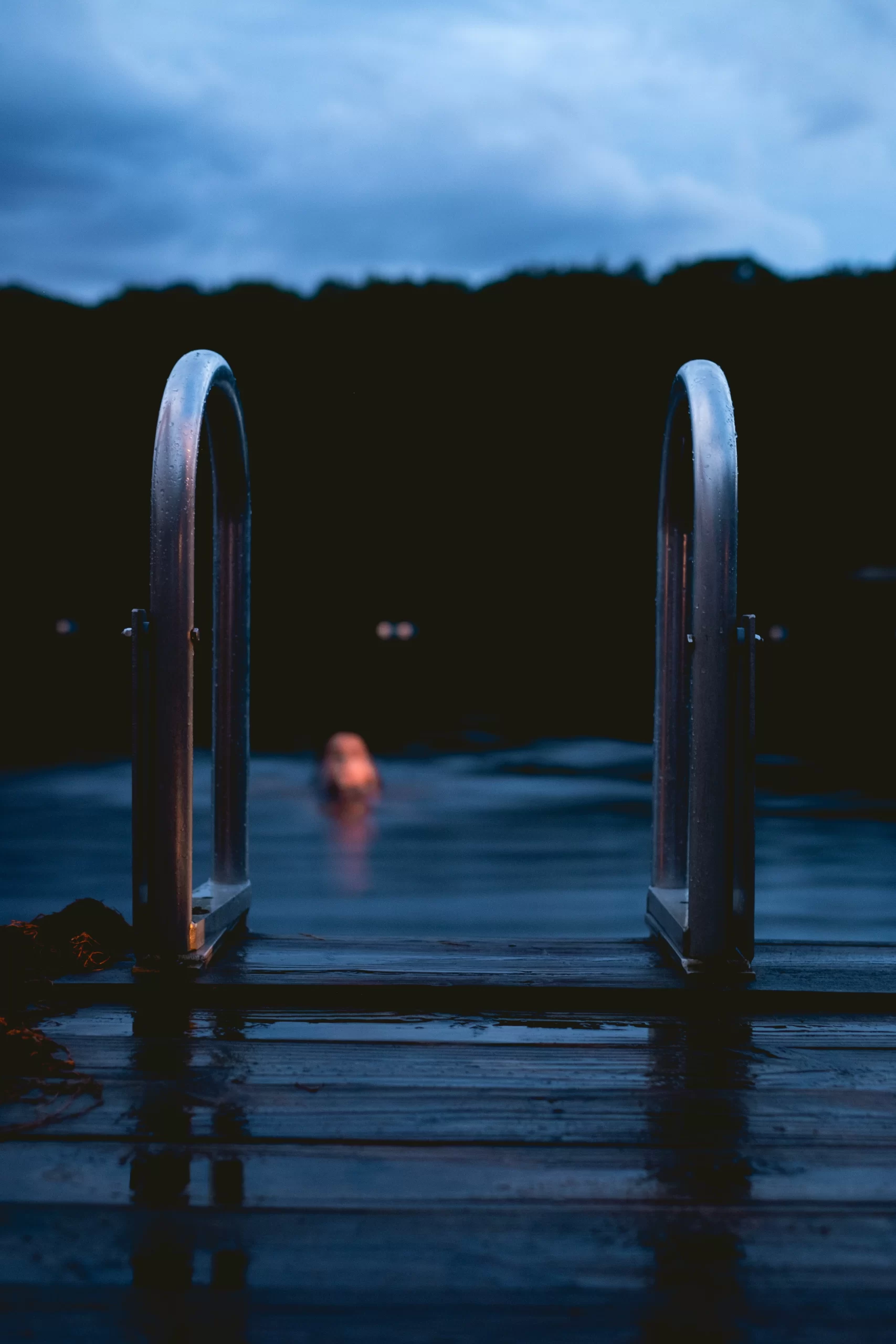 nick-dunlap-swimmer in pool wading -unsplash