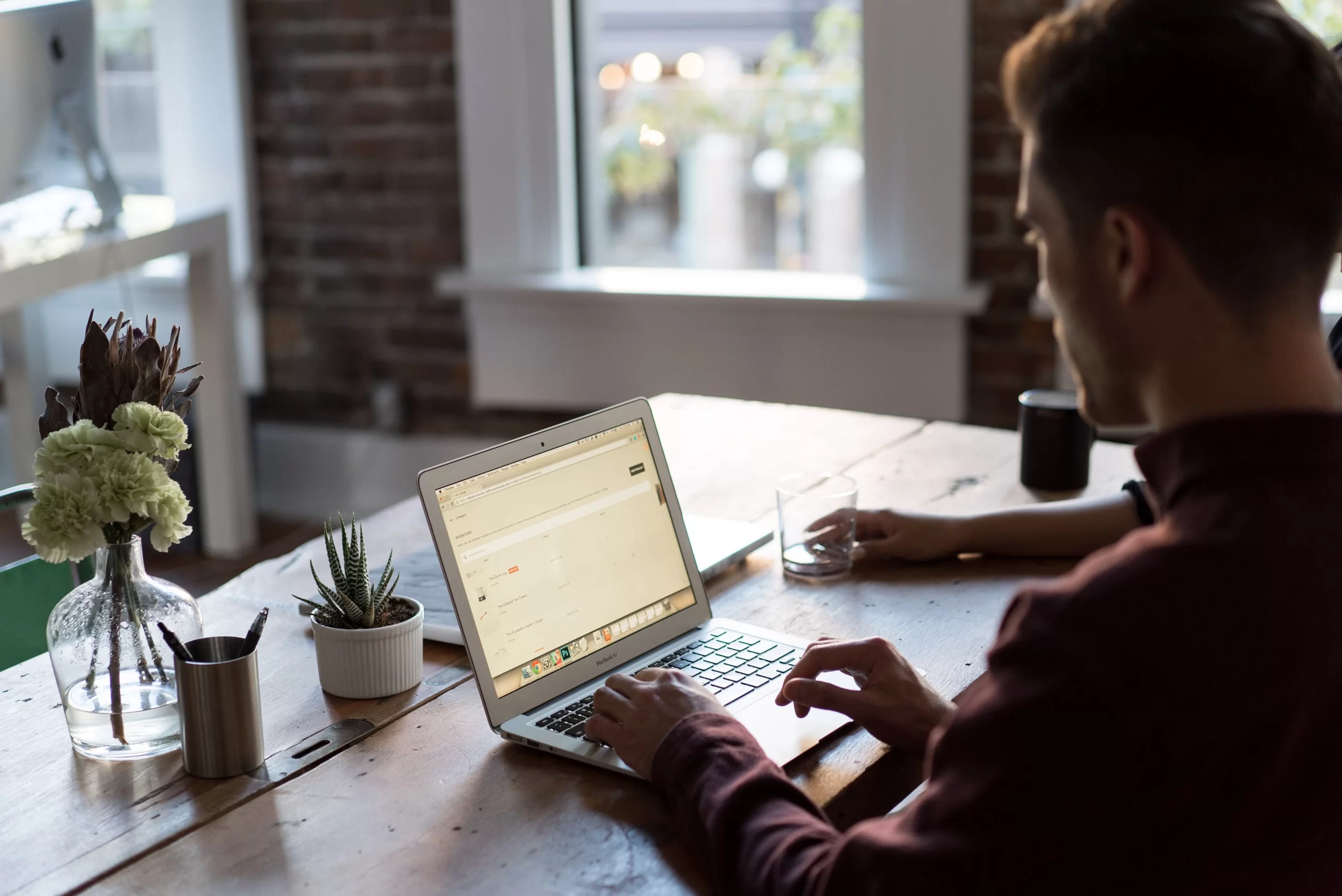 Published on November 30, 2015<br />
SONY, ILCE-7S<br />
Free to use under the Unsplash License<br />
Man at a laptop in an office by Bench Accounting on Unsplash