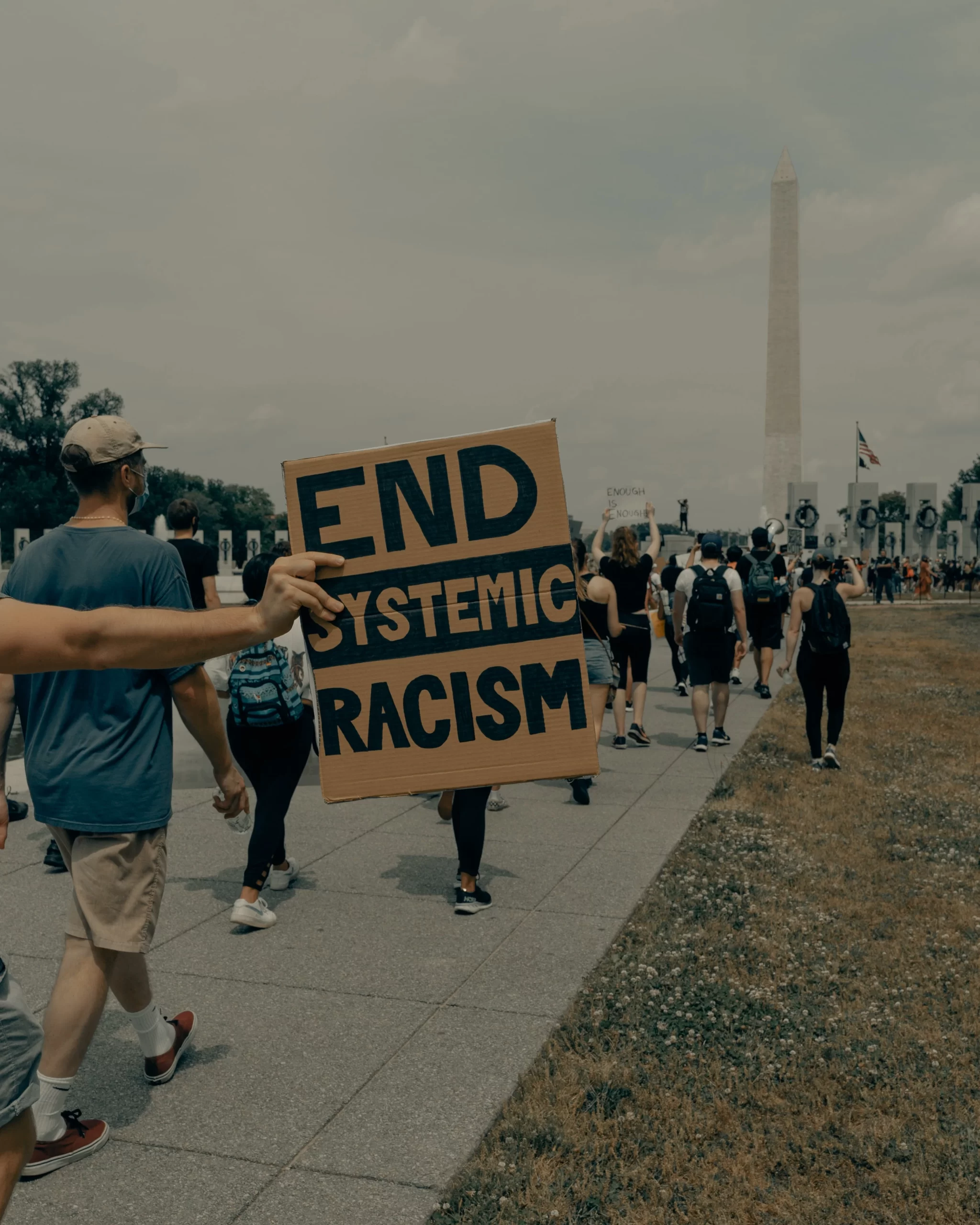 Washington D.C., DC, USA Published on June 8, 2020 SONY, ILCE-7M3 Free to use under the Unsplash License People march towards the Washington Monument at the Black Lives Matter protest in Washington DC 6/6/2020 (IG: @clay.banks)