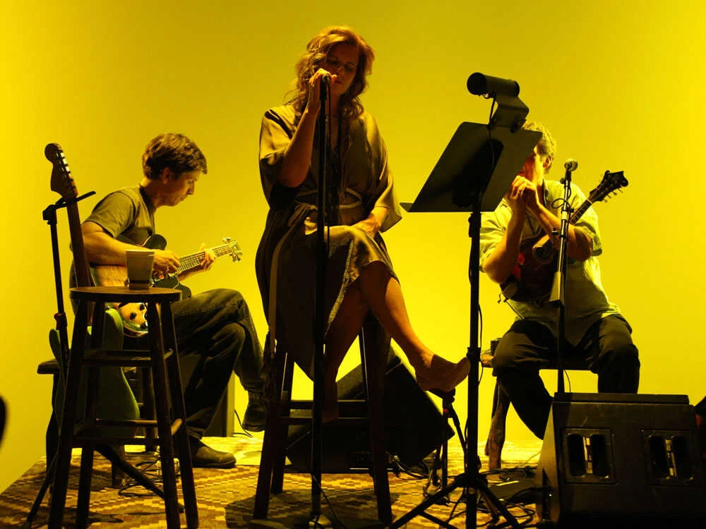 Cowboy Junkies NPR“Margo Timmins singing live during Cowboy Junkies Rockpalast 2010 performance” • “Michael Timmins performing with Cowboy Junkies during Renmin Park tour” • “Cowboy Junkies live set 2010 with moody lighting and acoustic guitar”