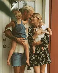 Trevor, Emily Hall with son 