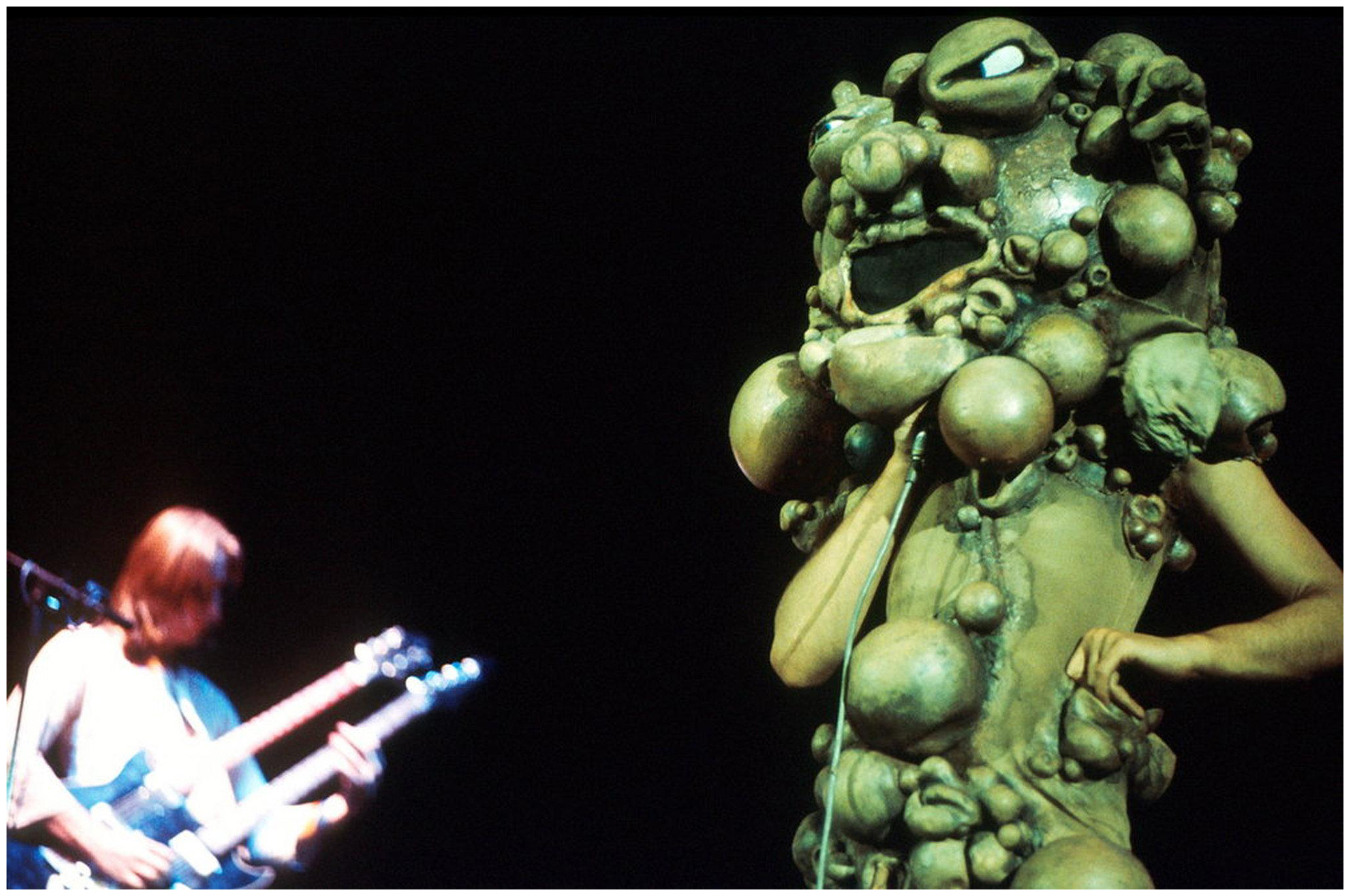 , Gabriel performs dressed as "The Slipperman," during the stage show for the band's 1974 album The Lamb Lies Down On Broadway Michael Putland Getty Images , Gabriel performs dressed as "The Slipperman," during the stage show for the band's 1974 album The Lamb Lies Down On Broadway Michael Putland Getty Images